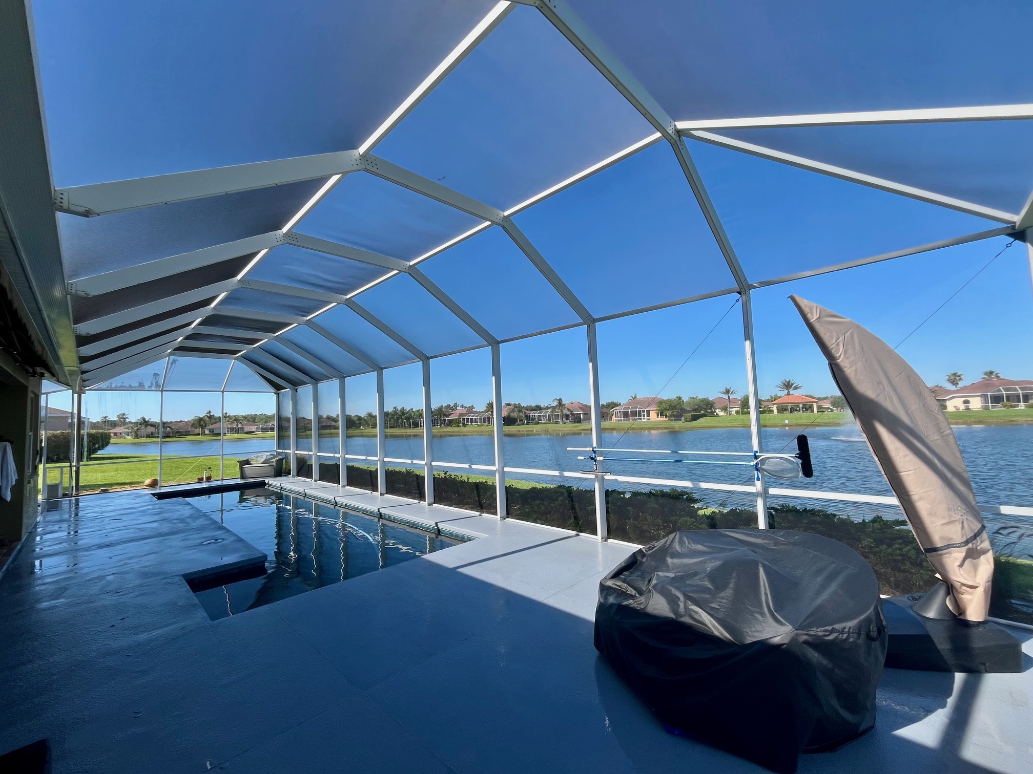 Pool Enclosure Cleaning Project In Venetian Bay, New Smyrna Beach, Florida