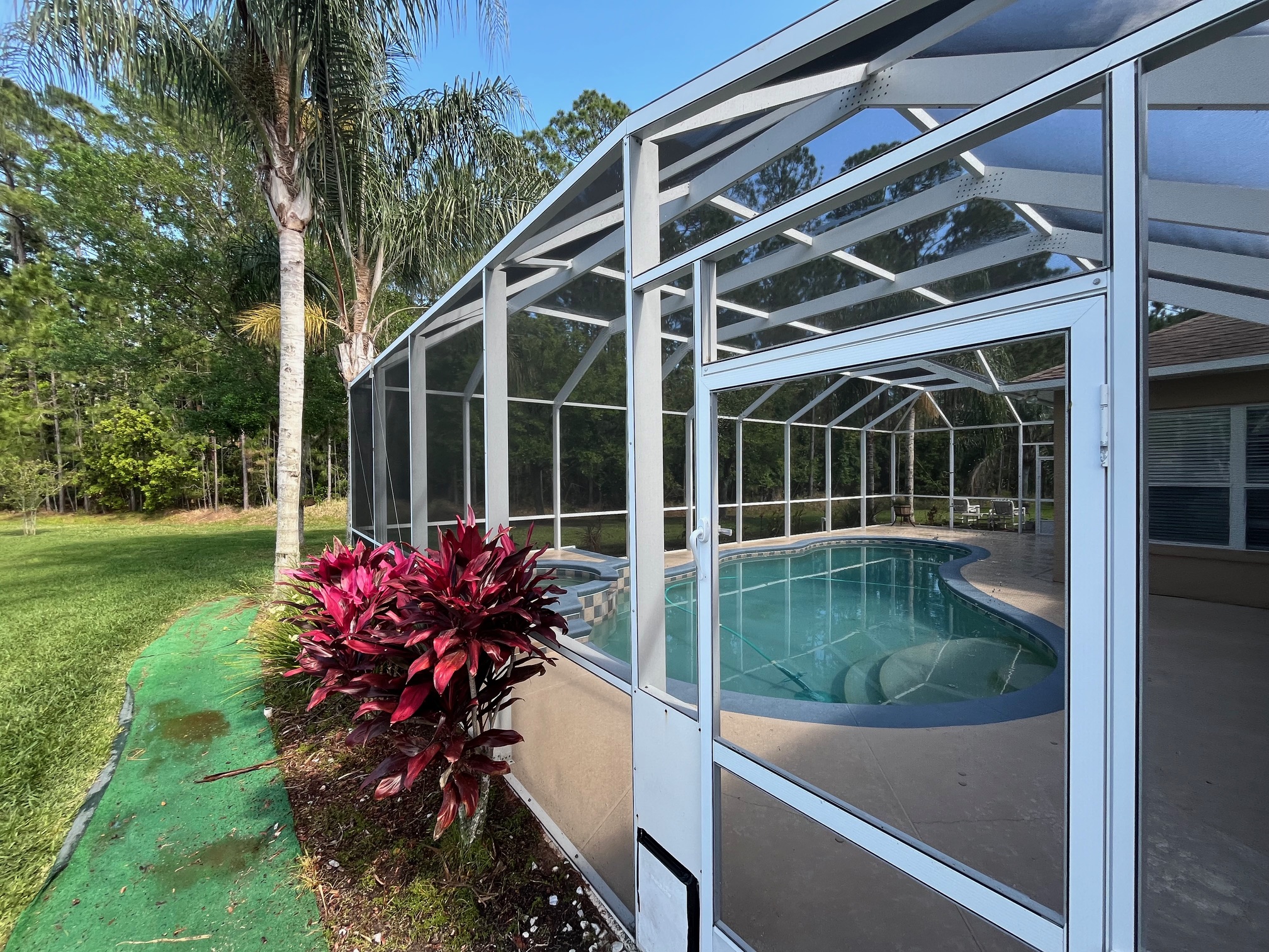 Pool Enclosure Cleaning Project In Port Orange, Florida
